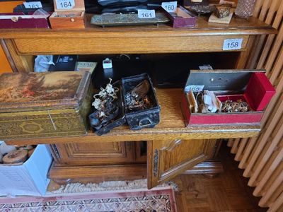 a wooden shelf with various items on it in a room