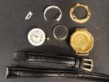 une image représentant une montre, un bracelet de montre, une montre et une bague