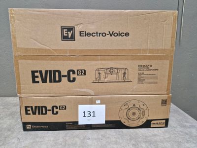 boxes of electronic devices are stacked on top of each other on a table