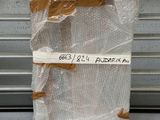 a bag of food wrapped in plastic sitting on a counter