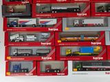 a lot of toy trucks that are in the box