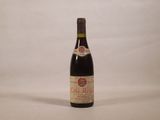 a bottle of wine that is sitting on a table