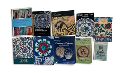 a lot of books that are sitting on a table