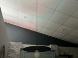 a light that is hanging from the ceiling in the room
