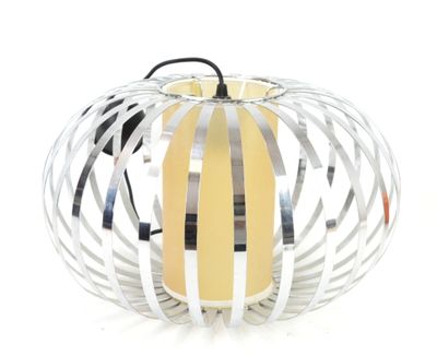 a candle that is sitting inside of a metal cage