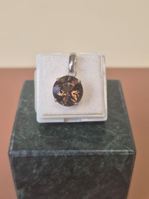 sterling silver pendant with a smokyite stone in a gift box