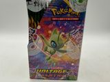 a close up of a box of pokemon trading cards on a table