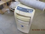 a small air conditioner sitting on top of a table