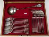 many spoons and spoon spoons in a box