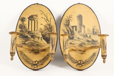 pair of antique painted wall sconces with figures on them