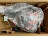 a box with a carton full of items in it