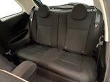the back seats of a car are black in color