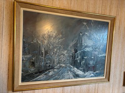 une image d'un tableau sur le mur d'une maison