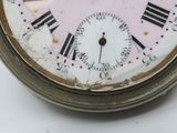 a close up of a clock with roman numerals on it