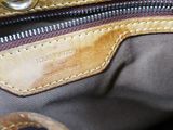 the inside of a louis vuitton bag with the zipper open