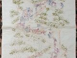 an image of a piece of embroidery on a piece of cloth
