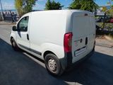 a white van parked on the side of the road