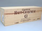 la boîte est en bois et porte une étiquette