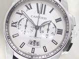 a close up of a watch with roman numerals on it