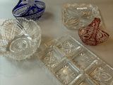 a table with a lot of glass items on it