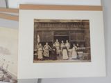 several old black and white photos of people standing in front of a store