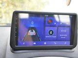 a picture of a car dashboard with a gps device on it