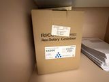 a cardboard box sitting on top of a shelf