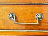 a close up of a drawer with a handle on it