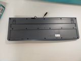 a laptop keyboard that is sitting on a table