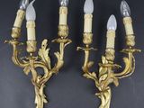 paire d'appliques murales anciennes en laiton avec des bougies