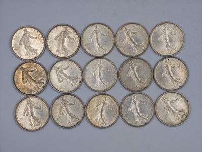 a close up of a bunch of coins sitting on top of a table