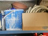 a blue shelf with a bunch of items on it
