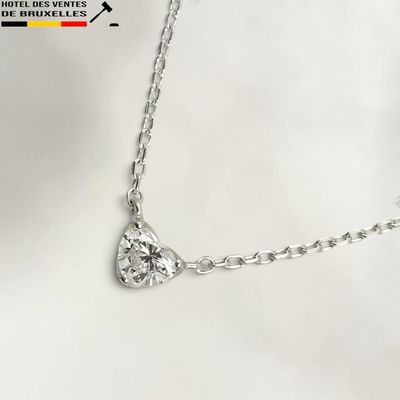 silver plated necklace with a heart shaped pendant on a silver chain