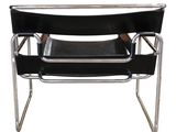 a black leather and chrome chair on a white background