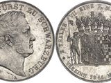 a close up of a coin with a crown on top of it