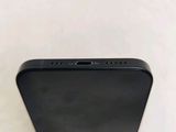 the back of a black iphone with the camera facing towards the camera