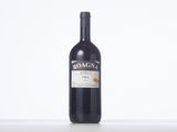 a bottle of wine that is sitting on a table