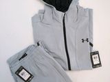 a close up of a person wearing a jacket and pants