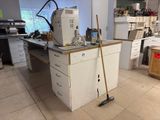 an image of a kitchen with a lot of clutter on the floor