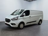 the white van is parked in a large room