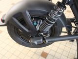 a close up view of a motorcycle ' s front suspension