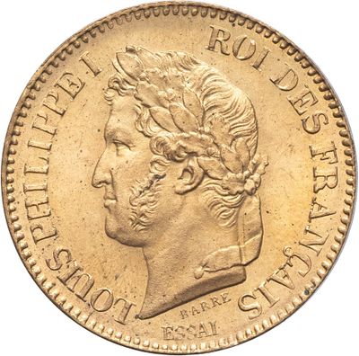 Gros plan sur une pièce d'or ornée d'une tête de femme