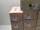 several boxes stacked on top of each other on a table