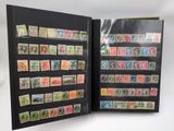 an open book with a lot of stamps on it
