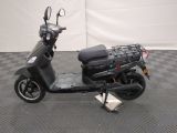 an image of a scooter parked on a checkered floor