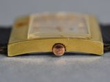 an image of a close up of a watch on a table