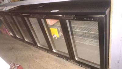 an image of a refrigerator that is in a garage