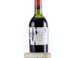 a bottle of wine that is sitting on a table