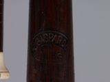 a close up of a baseball bat with a wooden handle