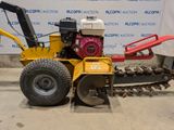 a small machine that is sitting on the ground